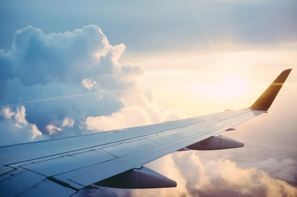 Aircraft wing above cloud